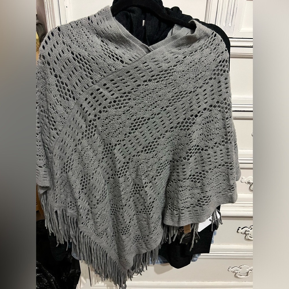 Really cute shawl. They are one size